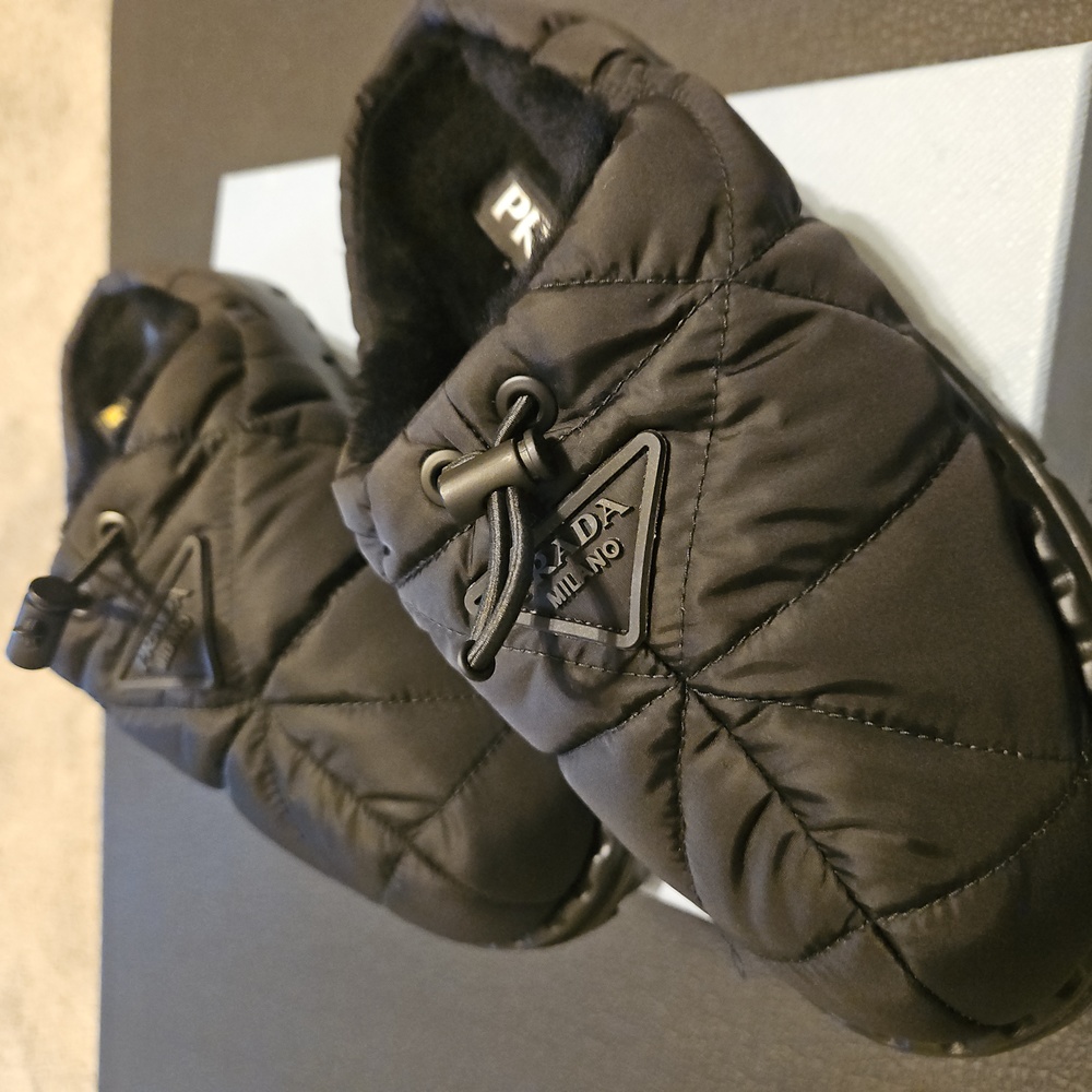 Prada Calzature Donna nylon piuma winter backless loafers